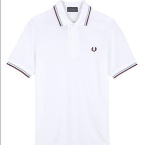 All white Fred perry polo with red/blue trim
